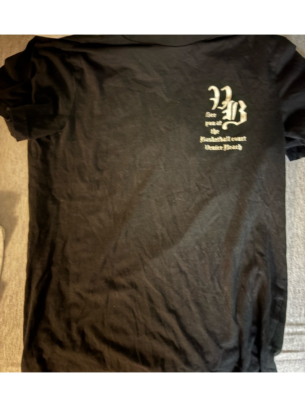 H&M Black Short-Sleeve Tee with White Chest Graphic